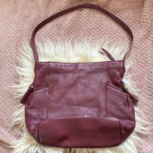 The Sak maroon / purple leather purse